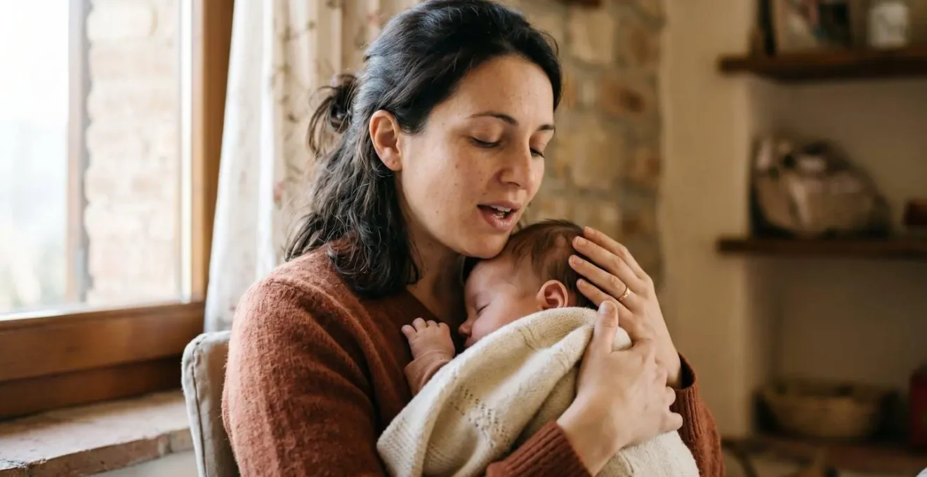 Momento intimo di una madre italiana che canta una ninna nanna tradizionale al proprio bambino